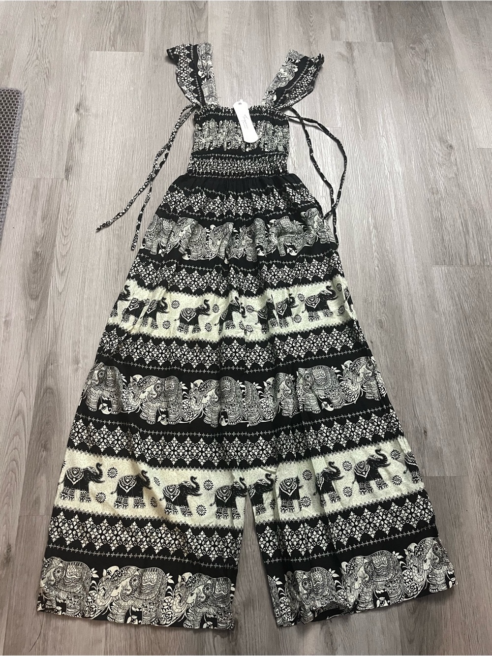 315–NWT Black & Cream Elephant Print Smocked Bodysuit Jumpsuit